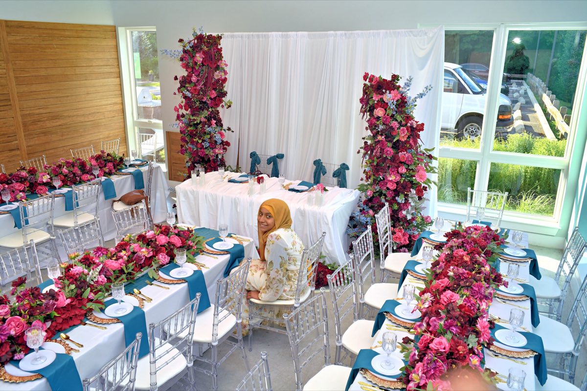 Burgundy and blush floral reception decor